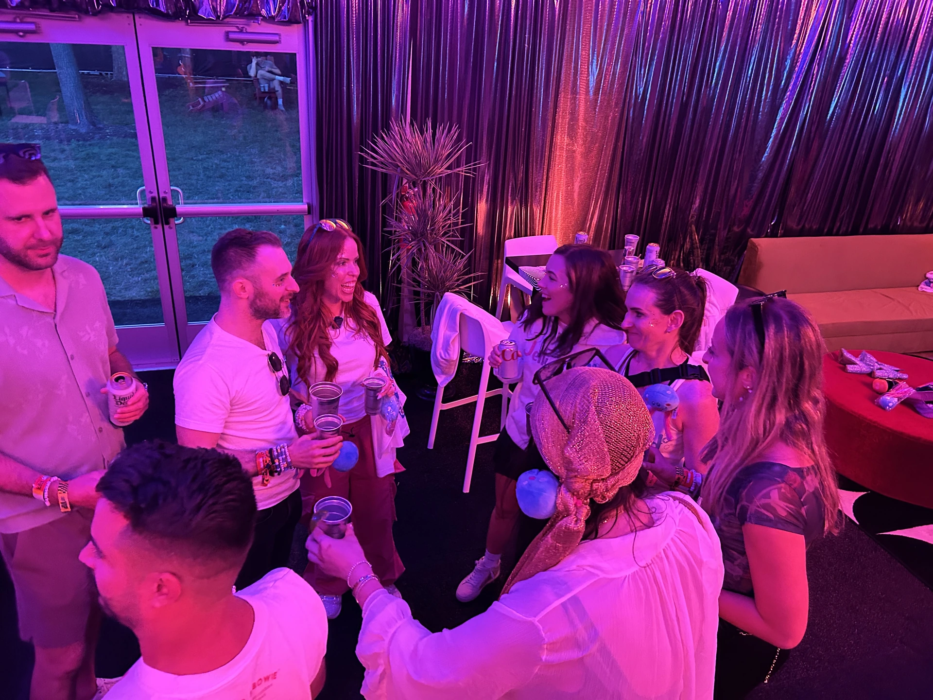 Dr. Laura talking with a group inside the JellyMed festival lounge